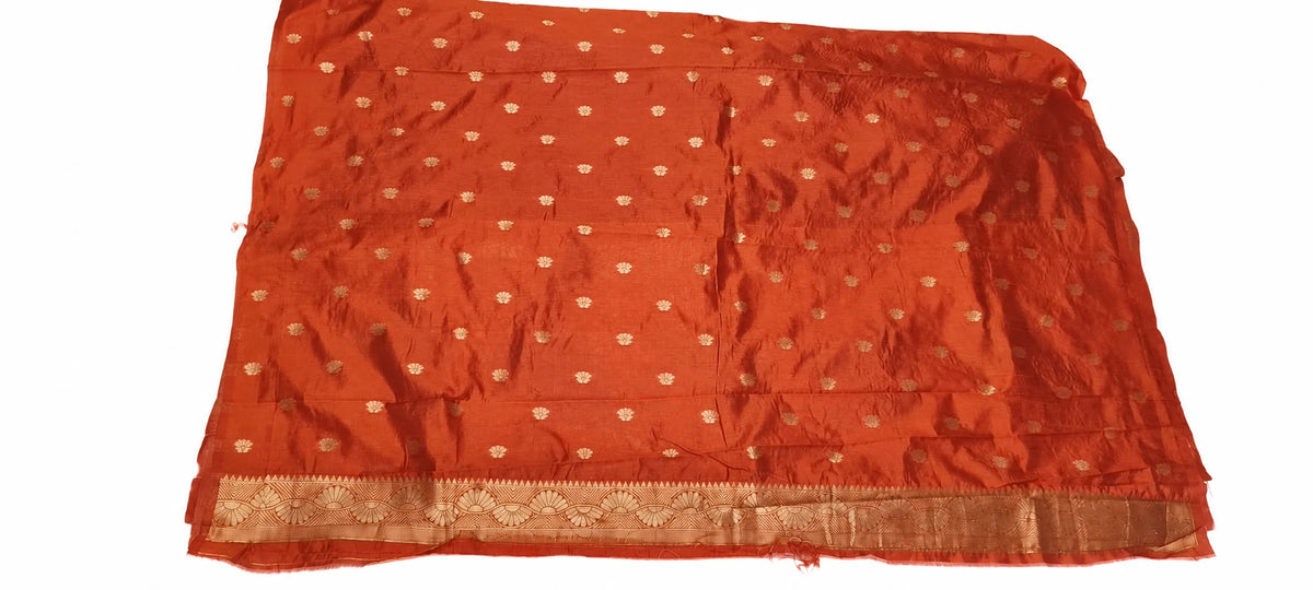 Urmila — Rust Gold Flower Saree, retouched garment view on a clean background