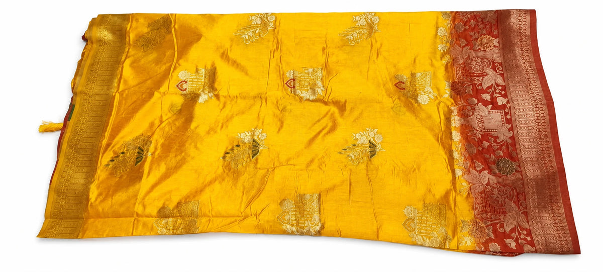 Nandini — Saffron Rust Floral Saree, retouched garment view 1 on a clean background