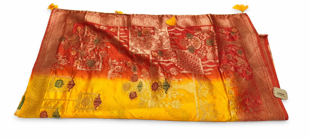 Nandini — Saffron Rust Floral Saree, retouched garment view 2 on a clean background