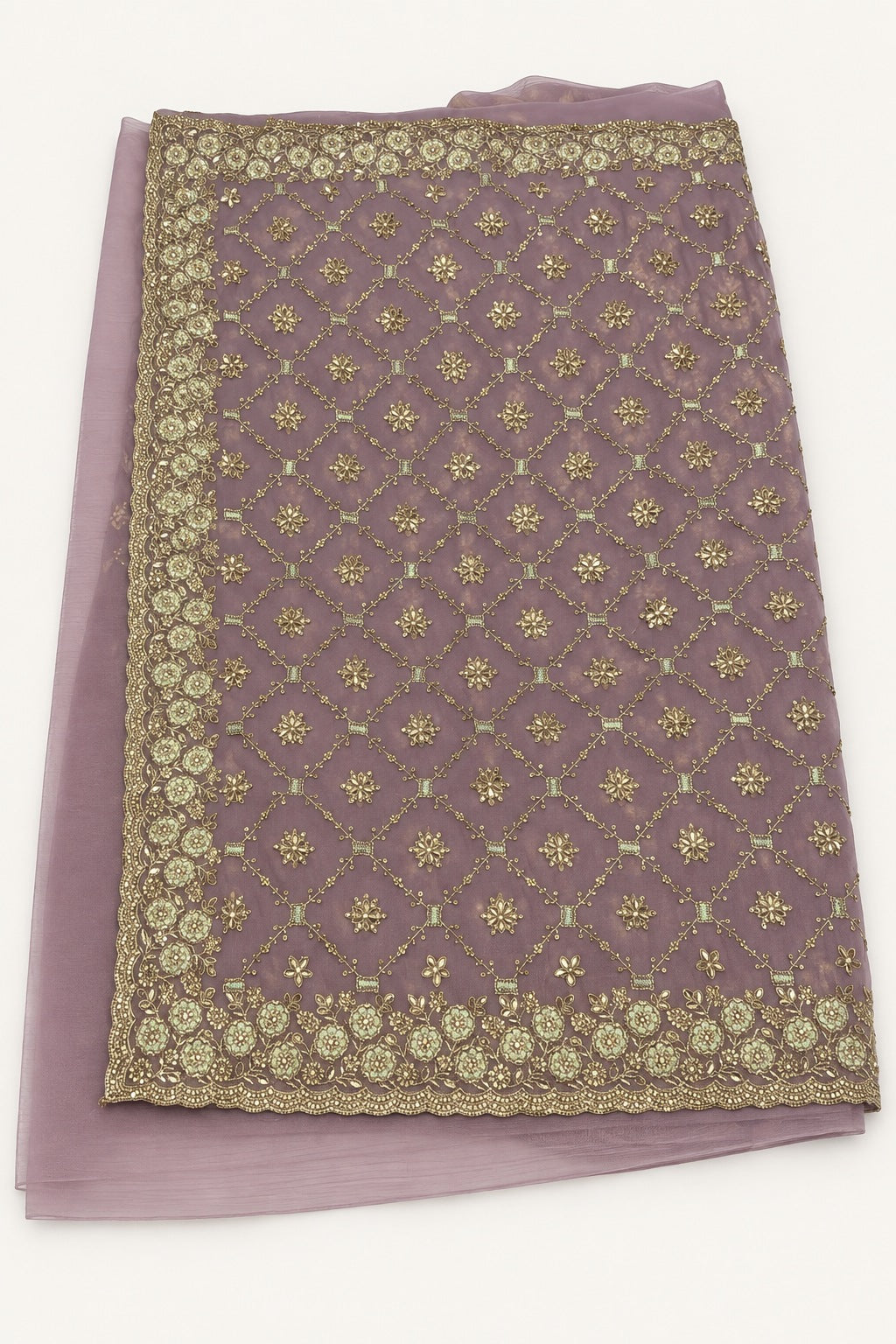 Background-retouched product photograph of the lavender saree showing gold-toned lattice and scalloped floral border