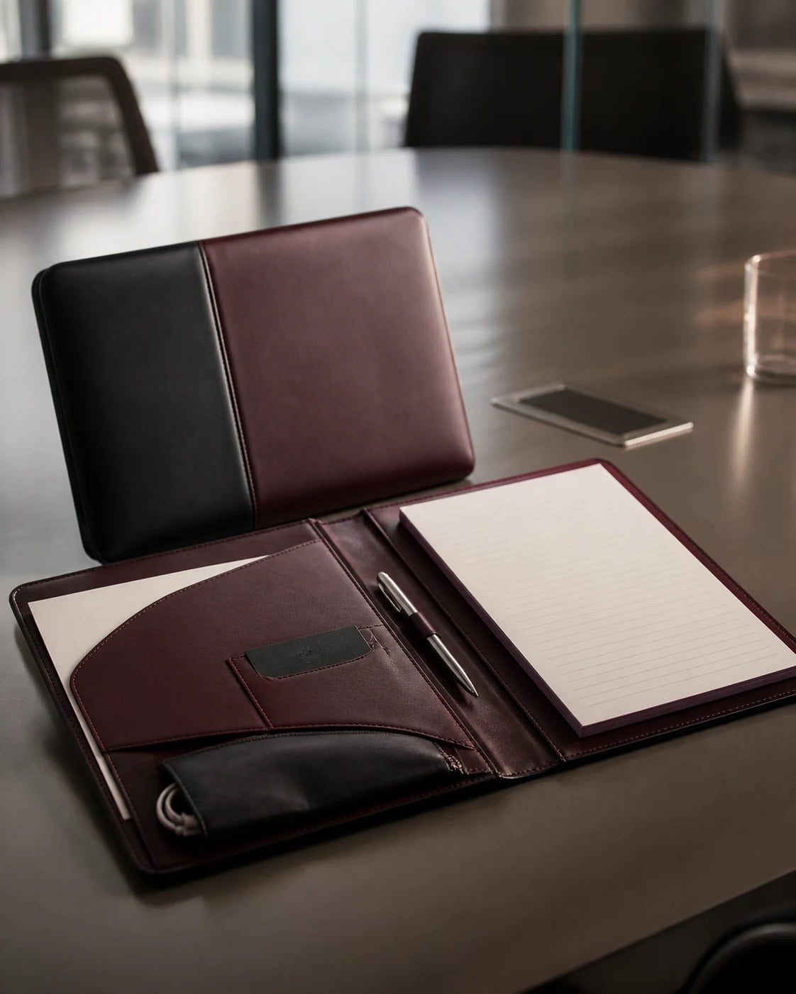Structured meeting folio with notebook, pen and work essentials